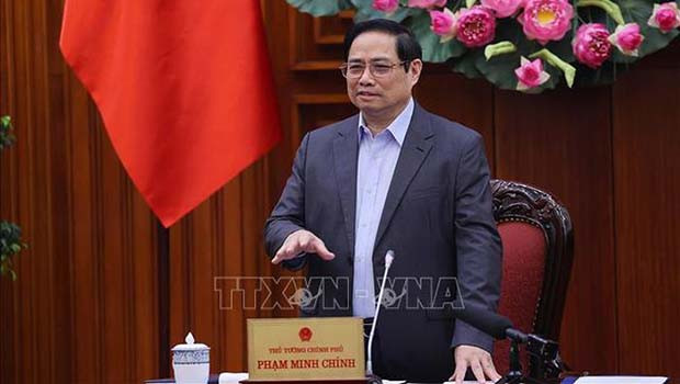 Thủ tướng Phạm Minh Ch&iacute;nh l&agrave;m việc với Li&ecirc;n hiệp c&aacute;c Hội Văn học Nghệ thuật Việt Nam. Ảnh: Dương Giang/TTXVN